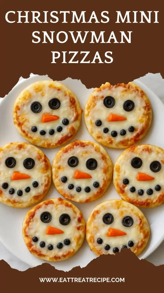 Modern minimalist mini snowman pizzas on white marble.