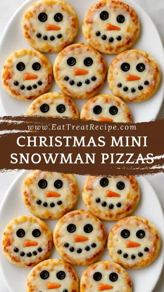 Modern minimalist mini snowman pizzas on white marble.