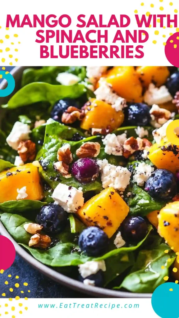 Mango salad with spinach and blueberries served in a modern minimalist bowl