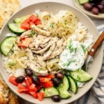 Slow Cooker Greek Chicken with lemon and herbs in a minimalist bowl
