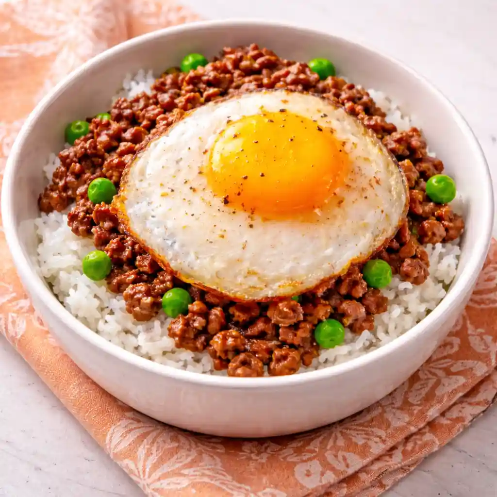 Human Kibble recipe meal prep bowls with ground beef, white rice, and steamed broccoli for high-protein weight loss.