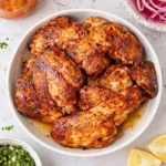 CAVA style harissa honey chicken bowl with toppings and mediterranean ingredients