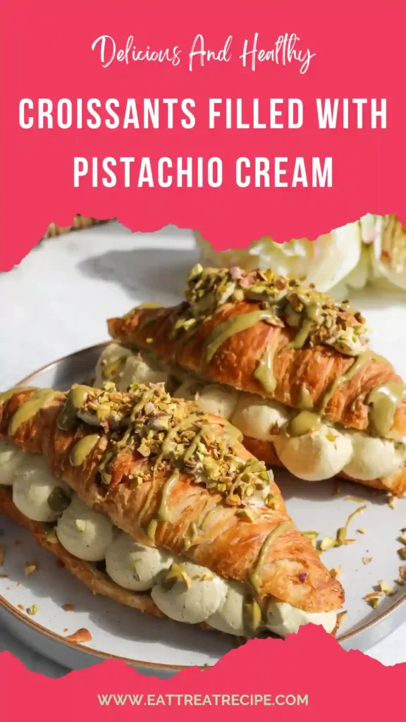 pistachio croissants served on plate with powdered sugar and pistachio topping